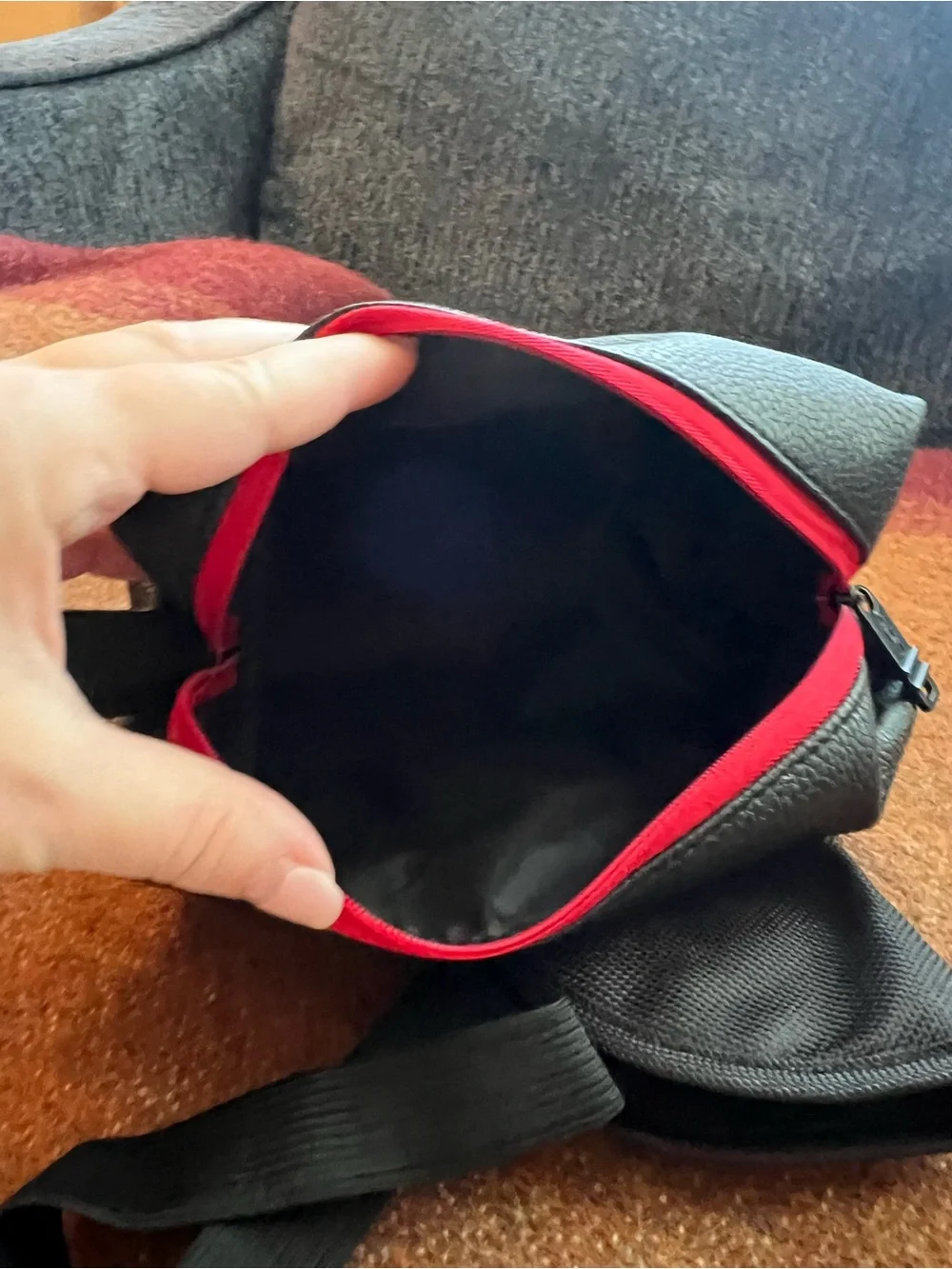 Tumi El Al Business Class Amenity Kit, featuring a black pebbled exterior